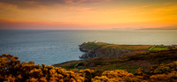 The sun sets at the Bailey Lighthouse