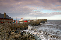 Waves hit Balbriggan Harbour wall